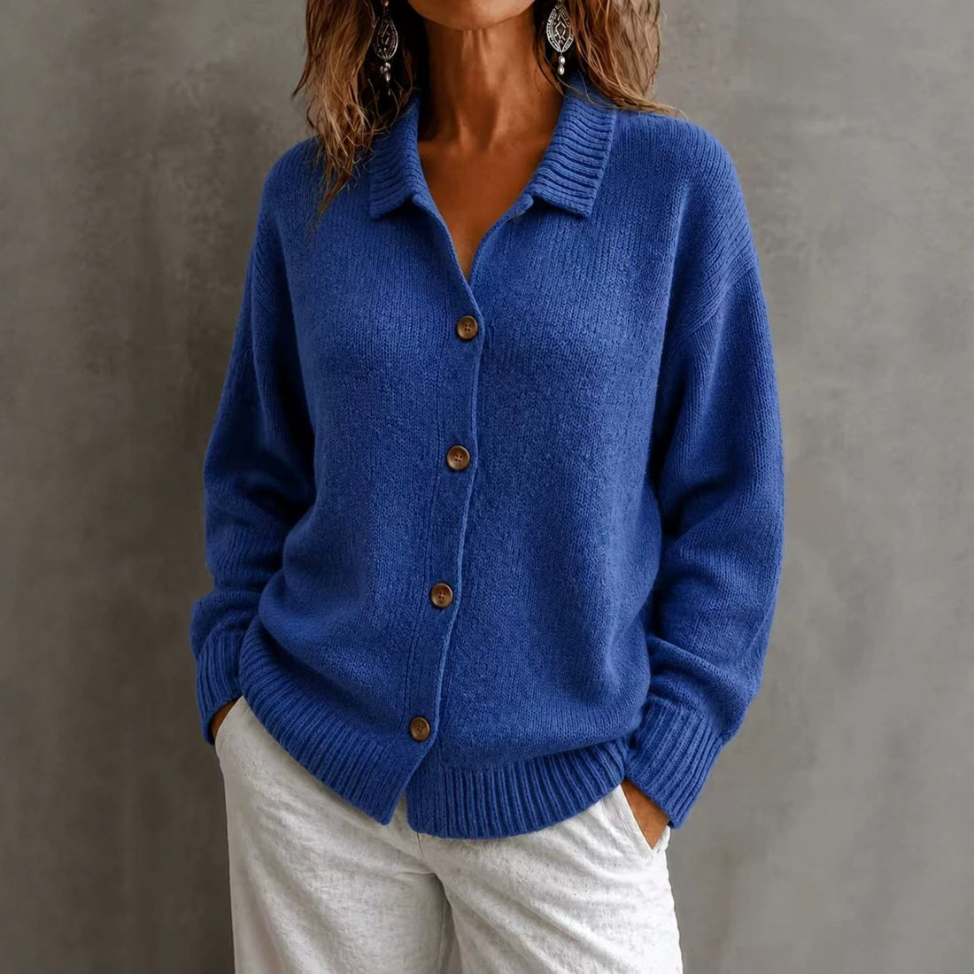 Single breasted long sleeved sweater jacket