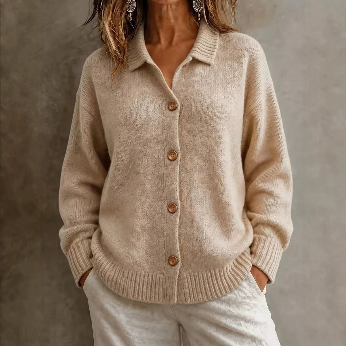 Single breasted long sleeved sweater jacket